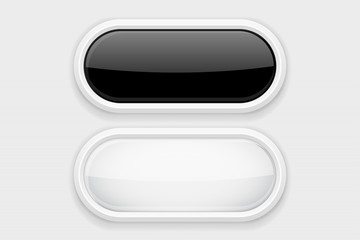 Black and white glass buttons on white plastic matted background