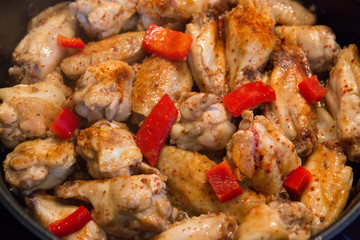 A roasted chicken pieces with vegetables .