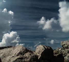 Cumulus and spindrift clouds hanging above the rocks in Simeiz, Crimea