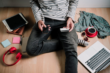 Hipster man hands holding smart phone