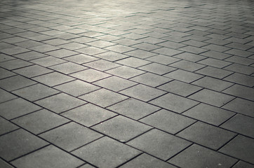Fototapeta premium Gray paving slabs in the city