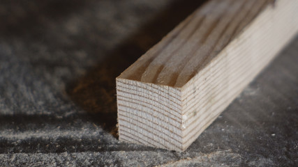 close up piece of wood on a carpenter's work table