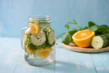 Detox water with vegetables and fruits. Diet healthy eating and weight loss.