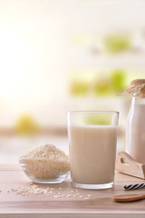 Rice drink in containers on a table in kitchen vertical