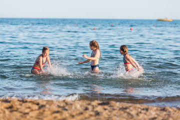 Happy kids on the beach