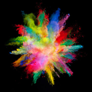 Abstract colored powder explosion isolated on black background.
