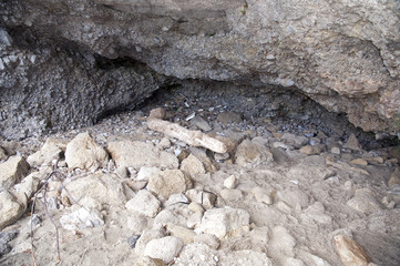 A small cave along the rugged seaside
