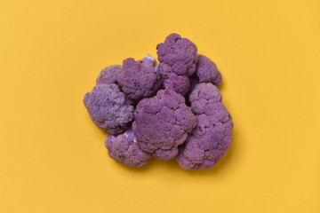 purple cauliflower on an orange background