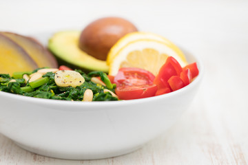 vegetables with lemon in white bowl