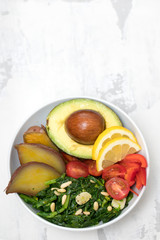 vegetables with lemon in white bowl
