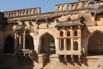 Queen baths in Hampi, Karnataka state, India. Carving stone ancient background. Unesco World...