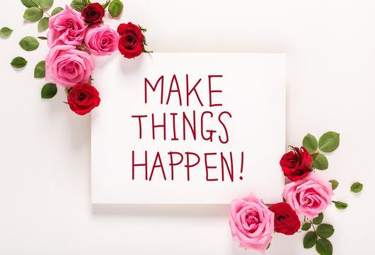 Make Things Happen message with roses and leaves top view flat lay