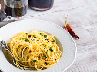 Spaghetti with spicy red pepper, garlic, olive oil. Traditional Italian pasta dish