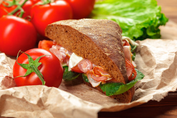 sandwich on a wooden table