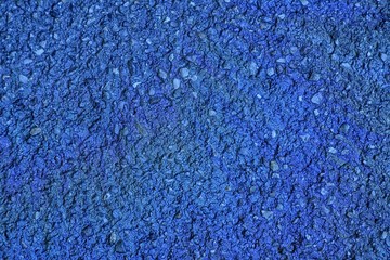 Fototapeta na wymiar ultra blue Oil spill on asphalt road, abstract background or texture foe web site or mobile devices