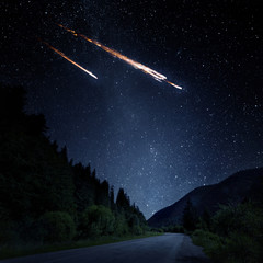 Falling meteorite, asteroid, comet on Earth. Elements of this image furnished by NASA. - obrazy, fototapety, plakaty