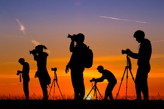 illustration of photographers at sunset