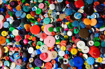 Sewing buttons background. Colorful sewing buttons texture