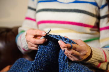 Close-up of hands knitting