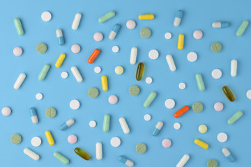 A variety of pharmaceutical ingredients on blue background