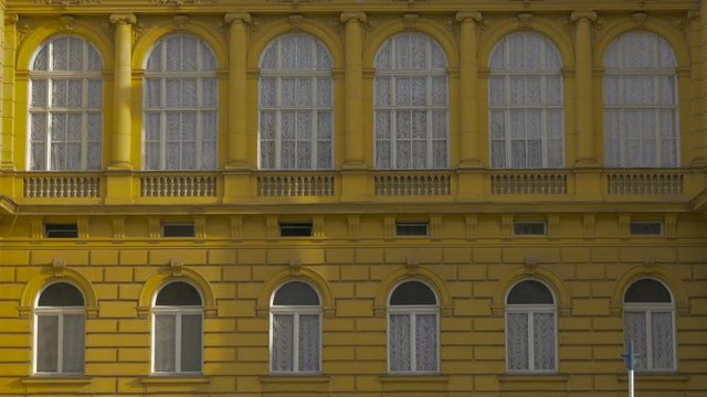 Close up of a yellow building