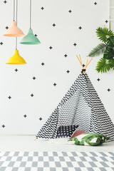 Patterned tent in playroom interior