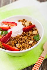 Strawberry Cinnamon Granola Yogurt Breakfast. Selective focus.