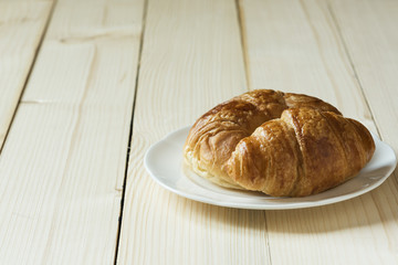 A delicious bread on a wooden background