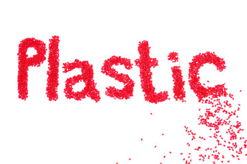 The words plastic of red plastic polymer isolated on a white background.