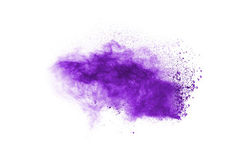 Powder explosion. Closeup of a purple dust particle explosion isolated on white. Abstract background.