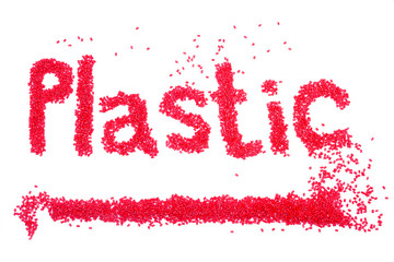 The words plastic of red plastic polymer isolated on a white background.
