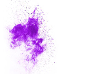 Purple powder explosion on white background. Colored cloud. Colorful dust explode. Paint Holi.