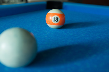 Sport billiard balls on blue billiard table