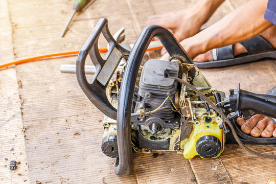 The old chainsaw machine to repair.