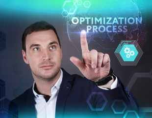 Business, Technology, Internet and network concept. Young businessman working on a virtual screen of the future and sees the inscription: Optimization process