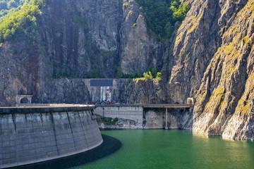 Daylight view to Vidraru dam and lake in Carpathian Mountains