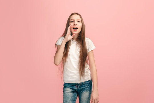 young casual teen girl shouting at studio