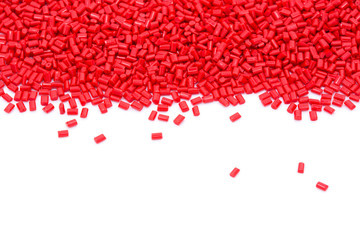 Red plastic polymer granules.