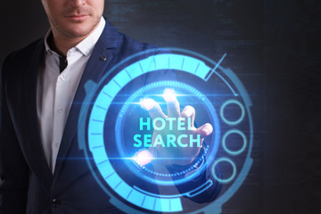 Business, Technology, Internet and network concept. Young businessman working on a virtual screen of the future and sees the inscription: Hotel search