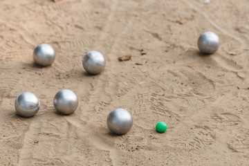 Boules and green jack ball in the match