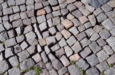 Roads: Old cobblestone pavement washed-out by a heavy summer rain