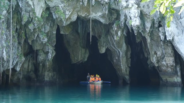 Tourists leaving Underground river by boat, Sabang, Philippines