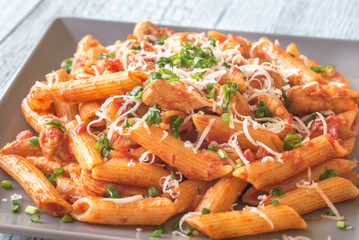 Portion of cheesy chicken pasta