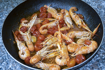 scampi sauce with pachino tomatoes