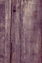 Rough surface of wooden plank with nail hole and cracks, textured background