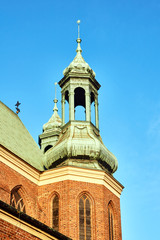 Fototapeta na wymiar Tower of medieval Gothic cathedral in Poznan.