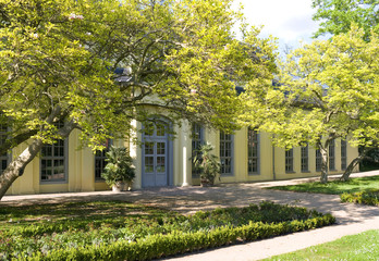 Altenburg / Germany: The baroque orangery in the public castle garden on a sunny day in May