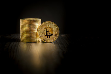  Bitcoin coins on black background