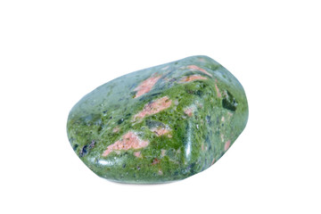 Macro shooting of natural gemstone. Raw mineral unakite, South Africa. Isolated object on a white background.