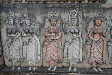 Sculptural relief in stone carving of traditional female goddess known as an Apsara